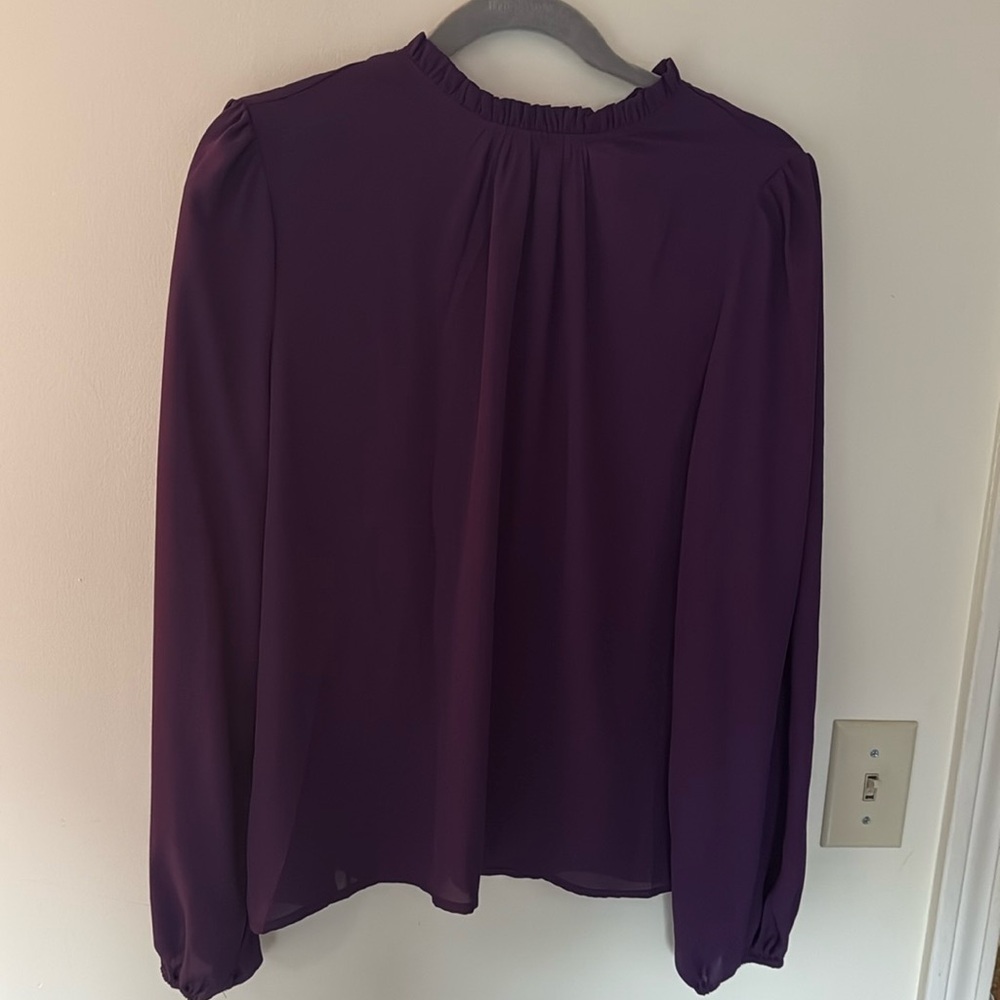 Purple dress top with ruffle neck and balloon sleeves